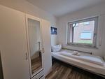 Schlafzimmer - Ferienwohnung Westwind Neßmersiel - Top-Hundeurlaub