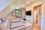 Schlafzimmer - Ferienhaus Boddenblick 15 Feriendorf Klein Stresow Rügen - Top-Hundeurlaub