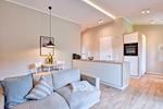 Wohnzimmer - Ferienhaus Bodden Hus 27 Feriendorf Klein Stresow Rügen - Top-Hundeurlaub