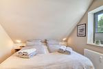 Schlafzimmer - Ferienwohnung Wandashorst 25 Feriendorf Klein Stresow Rügen - Top-Hundeurlaub