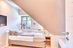 Schlafzimmer - Ferienwohnung Wandashorst 25 Feriendorf Klein Stresow Rügen - Top-Hundeurlaub
