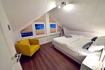 Schlafzimmer - Ferienwohnung Strandnest in der Villa Gudrun Binz - Top-Hundeurlaub