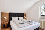 Schlafzimmer - Ferienwohnung Strandnest in der Villa Gudrun Binz - Top-Hundeurlaub