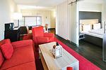Wohn-Essbereich mit Couch - Resort Deichgraf 27-15 - Top-Hundeurlaub