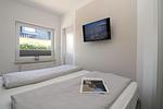 Schlafzimmer - Appartementanlage Zaunkönig Fewo 5 - Top-Hundeurlaub