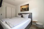 Schlafzimmer - Appartementanlage Zaunkönig Fewo 5 - Top-Hundeurlaub