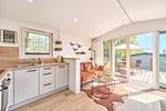 Wohnzimmer - Ferienhaus Koje 119 – mit Zweirad-Garage für Motorrad, Moped & Fahrrad - Top-Hundeurlaub