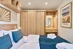 Schlafzimmer - Ferienhaus Koje 119 – mit Zweirad-Garage für Motorrad, Moped & Fahrrad - Top-Hundeurlaub