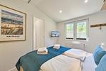 Schlafzimmer - Ferienhaus Koje 119 – mit Zweirad-Garage für Motorrad, Moped & Fahrrad - Top-Hundeurlaub