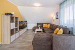 Wohnzimmer - Ferienhaus Sonnenschein OG mit Balkon und Garten mit Spielanlage - Top-Hundeurlaub