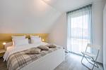 Schlafzimmer - Ferienhaus Sonnenschein OG mit Balkon und Garten mit Spielanlage - Top-Hundeurlaub