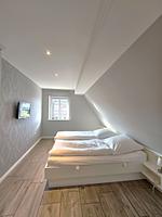 Schlafzimmer - Golfoase 1 - Doppelhaushälfte für 6 Personen - Top-Hundeurlaub