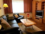 Wohnzimmer - Haus am Leuchtturm - Top-Hundeurlaub