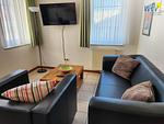 Wohnzimmer - Ferienwohnung Neuer Leuchtturm - Top-Hundeurlaub