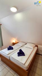 Schlafzimmer - Ferienwohnung Alter Leuchtturm - Top-Hundeurlaub