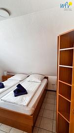 Schlafzimmer - Ferienwohnung Alter Leuchtturm - Top-Hundeurlaub