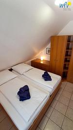 Schlafzimmer - Ferienwohnung Alter Leuchtturm - Top-Hundeurlaub