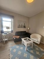 Wohnzimmer - Promenadenblick - Wohnung 1 - Top-Hundeurlaub