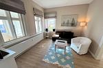 Wohnzimmer - Promenadenblick - Wohnung 1 - Top-Hundeurlaub
