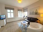 Wohnzimmer - Promenadenblick - Wohnung 1 - Top-Hundeurlaub