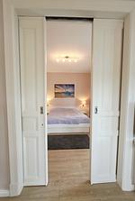 Schlafzimmer - Promenadenblick - Wohnung 1 - Top-Hundeurlaub