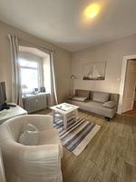 Wohnzimmer - Promenadenblick - Wohnung 2 - Top-Hundeurlaub