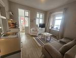 Wohnzimmer - Promenadenblick - Wohnung 2 - Top-Hundeurlaub