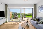 Wohnzimmer - Ferienwohnung TheViewB02 Achter de Diek Dagebüll - Top-Hundeurlaub