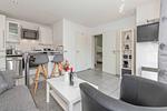 Wohnzimmer - Haus 3 mit Sauna, Terrasse und Whirlpool - Top-Hundeurlaub