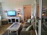 Wohnzimmer - Helle Strandwohnung mit Meerblick - Top-Hundeurlaub