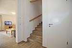 Treppenaufgang zum Obergeschoss - Reethaus 19a - Top-Hundeurlaub