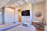 Schlafzimmer - Ferienhaus Boddenlust 24 Feriendorf Klein Stresow Rügen - Top-Hundeurlaub