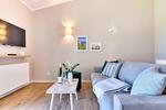 Wohnzimmer - Ferienhaus Frische Brise 33 Feriendorf Klein Stresow Rügen - Top-Hundeurlaub