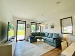Wohnzimmer - Ferienwohnung Inselglück 3 Parkvillen Carlota und Candela Baabe - Top-Hundeurlaub