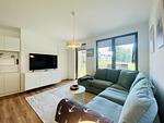 Wohnzimmer - Ferienwohnung Inselglück 3 Parkvillen Carlota und Candela Baabe - Top-Hundeurlaub