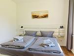 Schlafzimmer - Ferienwohnung Inselglück 3 Parkvillen Carlota und Candela Baabe - Top-Hundeurlaub