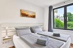 Schlafzimmer - Ferienwohnung Inselglück 3 Parkvillen Carlota und Candela Baabe - Top-Hundeurlaub