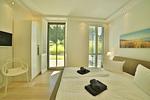 Schlafzimmer - Ferienwohnung Strandlounge in den Parkvillen Binz - Top-Hundeurlaub