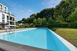Poolblick - Ferienwohnung Strandlounge in den Parkvillen Binz - Top-Hundeurlaub