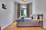 Schlafzimmer - Ferienwohnung Fürst Malte Loft I Design & Pool Putbus - Top-Hundeurlaub