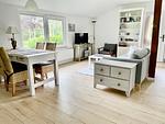 Wohnzimmer - Ferienwohnung Hühnerstall Hasselberg - Top-Hundeurlaub
