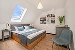 Schlafzimmer - Ferienwohnung Dock12C - Top-Hundeurlaub