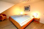 gemütliches Doppelbett - Mittelstraße 18, Whg. 1, Haus am Rosenbeet - Top-Hundeurlaub