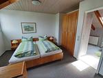 Schlafzimmer - Maisonette-Wohnung B1**** - Top-Hundeurlaub