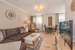 Wohnzimmer - Ferienwohnung Zum Sonnenuntergang - Top-Hundeurlaub