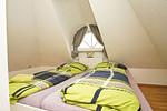 Schlafzimmer - FeWo OG+DG: Balkon, ruhige Lage - Top-Hundeurlaub