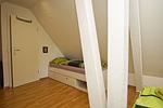 Schlafzimmer - FeWo OG+DG: Balkon, ruhige Lage - Top-Hundeurlaub