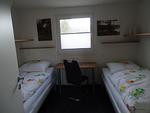 Schlafzimmer - Birkenhain 3b - Lastering Ferienhäuser & Apartments - Top-Hundeurlaub
