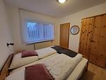 Schlafzimmer - Wohnung Delphin EG - Top-Hundeurlaub