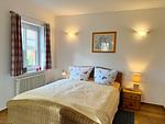 Schlafzimmer 2 mit Doppelbett - Ferienhaus am Lebbiner Bodden - Top-Hundeurlaub